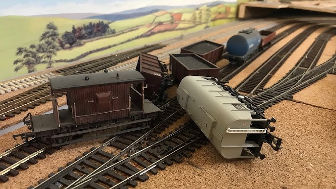 How Do I Troubleshoot Common Issues With My Model Train Layout, Like Derailments?